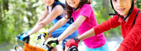 Three children on bikes