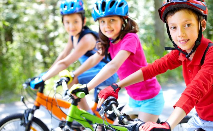 Three children on bikes